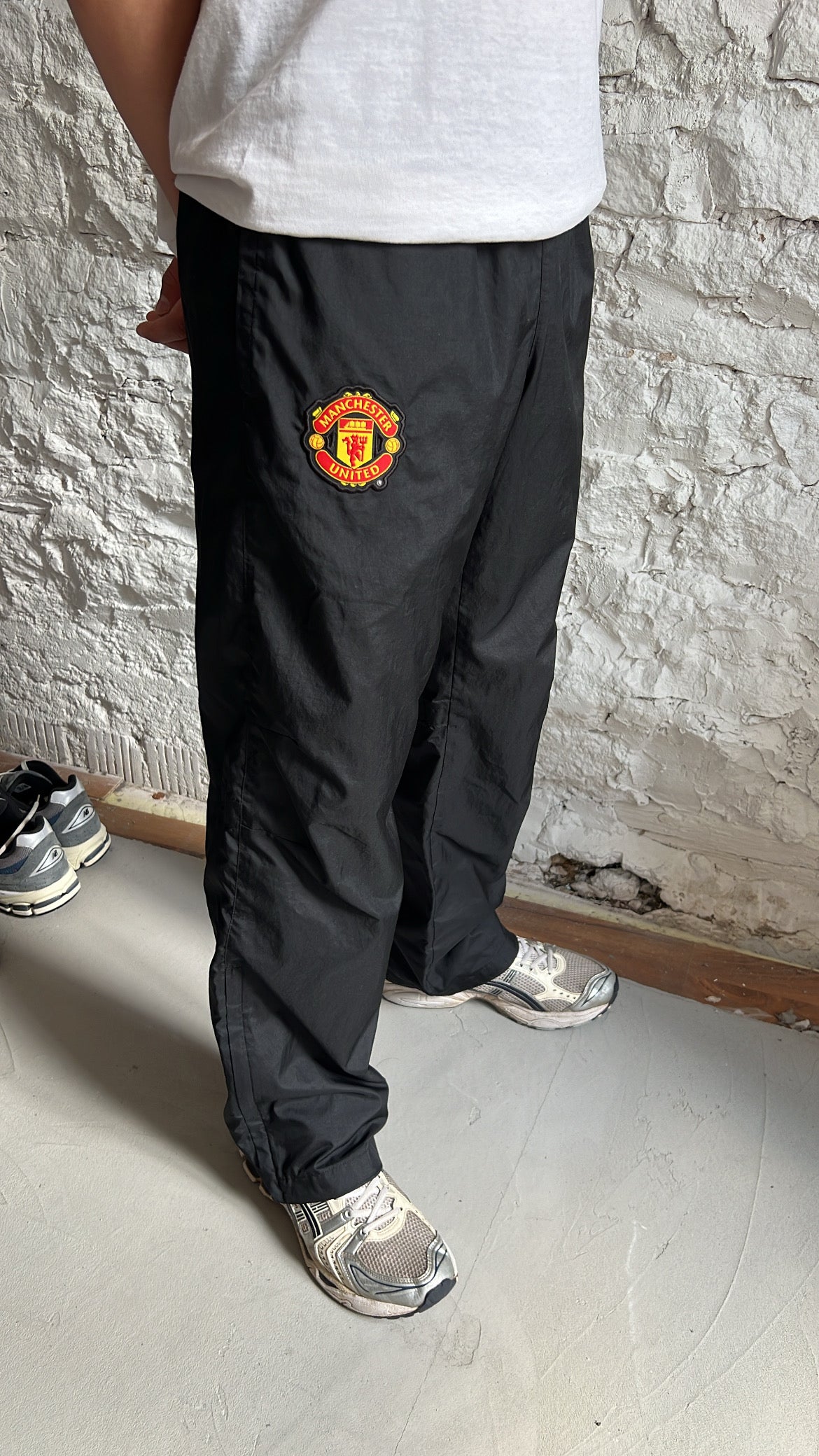 BLACK MANCHESTER UNITED NIKE TRACK PANTS - 2000S - S/M