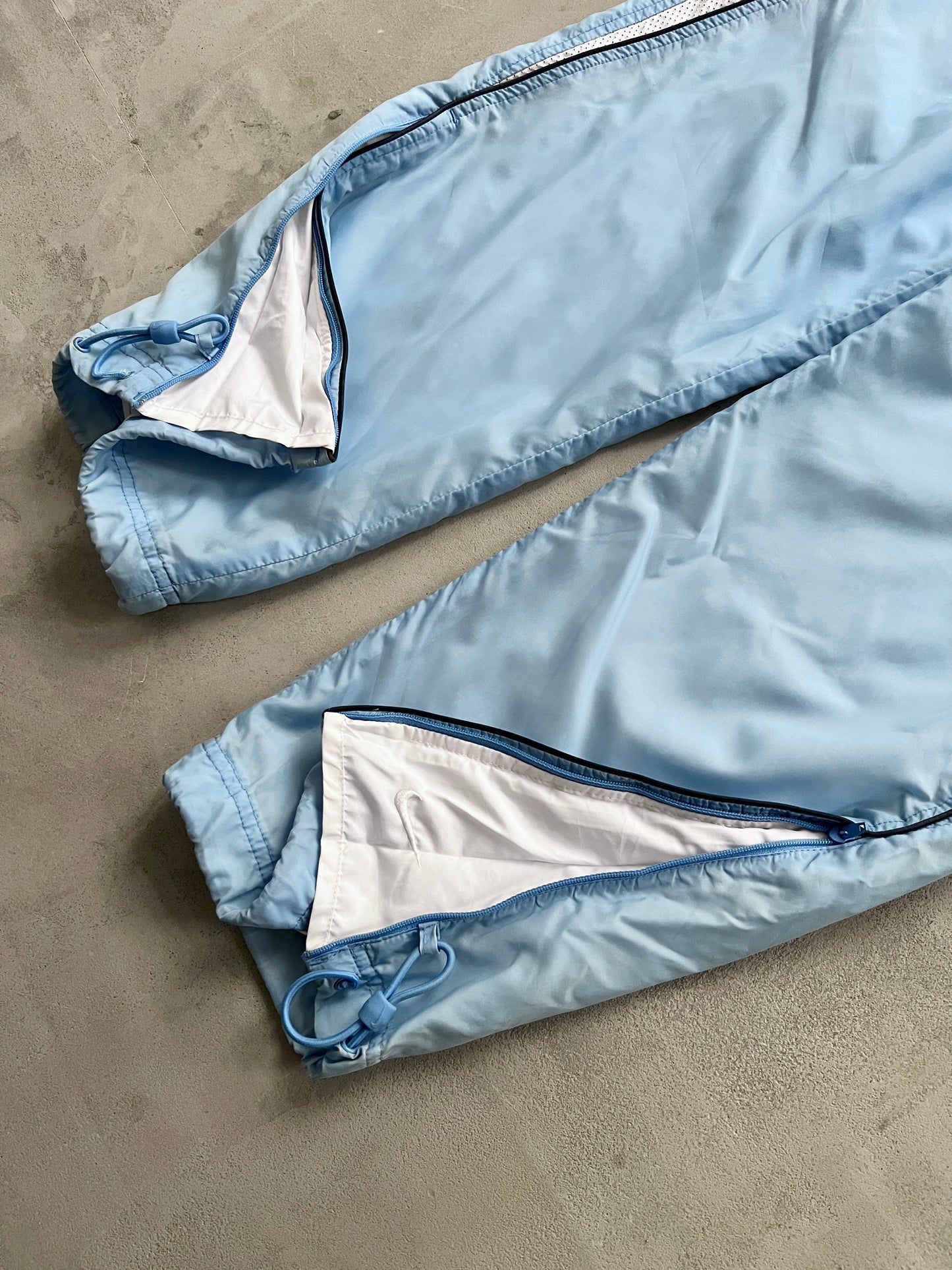 BABY BLUE/WHITE NIKE TRACK PANTS - 2000S - L