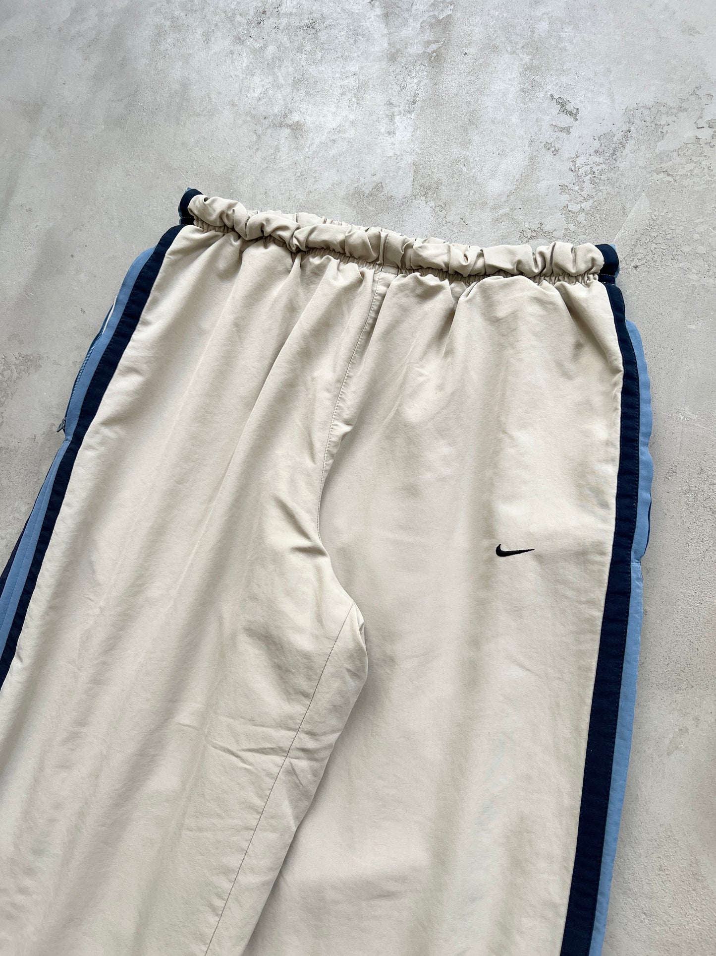 LIGHT BEIGE/BLUE NIKE TRACK PANTS - 2000S - M/L